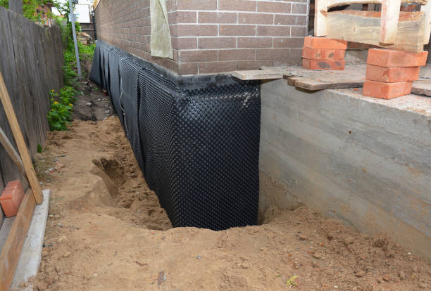 Happy homeowners after waterproofing job in Ardmore